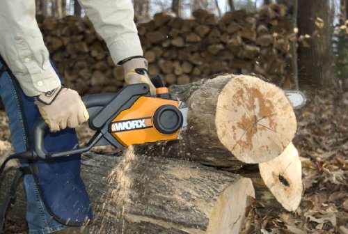 cutting down a tree with a chainsaw